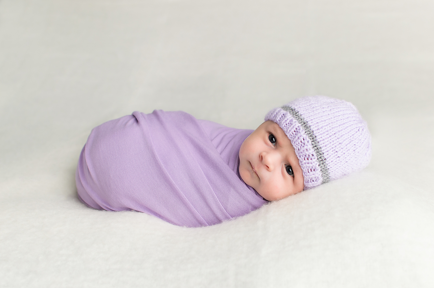 December 31 2015-Tabatha Sue Photography-Parma Heights Ohio-Purple Baby Wrapped-Purple Crochet Puff Stitch Bonnet Newborn-Creamy Blanket-Awake Baby-Newborn Pictures with Eyes Open.jpg