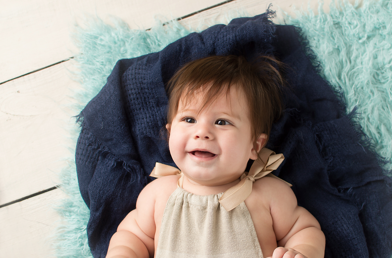 November 6 2015-Tabatha Sue Photography-Parma Ohio-Blue Fur-Navy Layer for Photo Session-White Wooden Backdrop-Baby Boy Brown Eyes-Big Smile-Baby Pictures.jpg