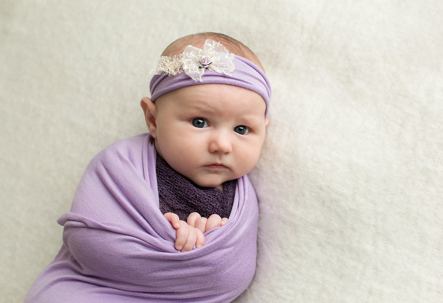 October-2016-Tabatha-Sue-Photography-Best-baby-photographer-in-parma-ohio-near-cleveland-ohio-baby-in-purple-headband-and-wrap-professional-home-studio-in-44130.png
