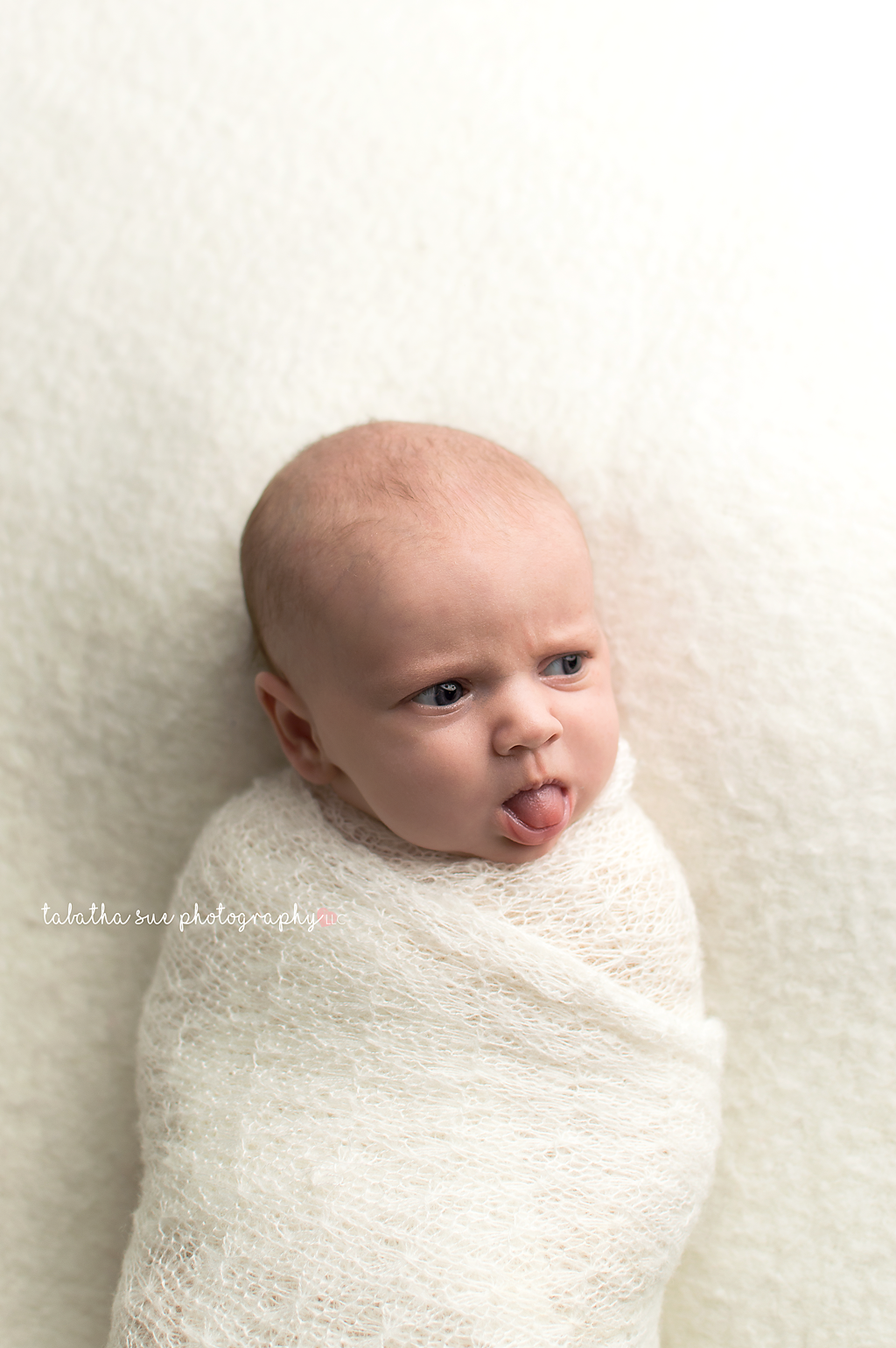 newborn-pictures-simple-white-backdrop-and-wrap-professional-photographer-strongsville-ohio.png